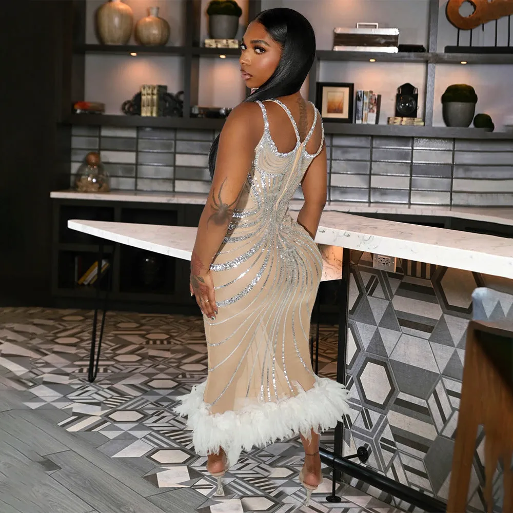Glamorous Crystal-Embellished Sheer Bodycon Evening Gown with Feather Hem