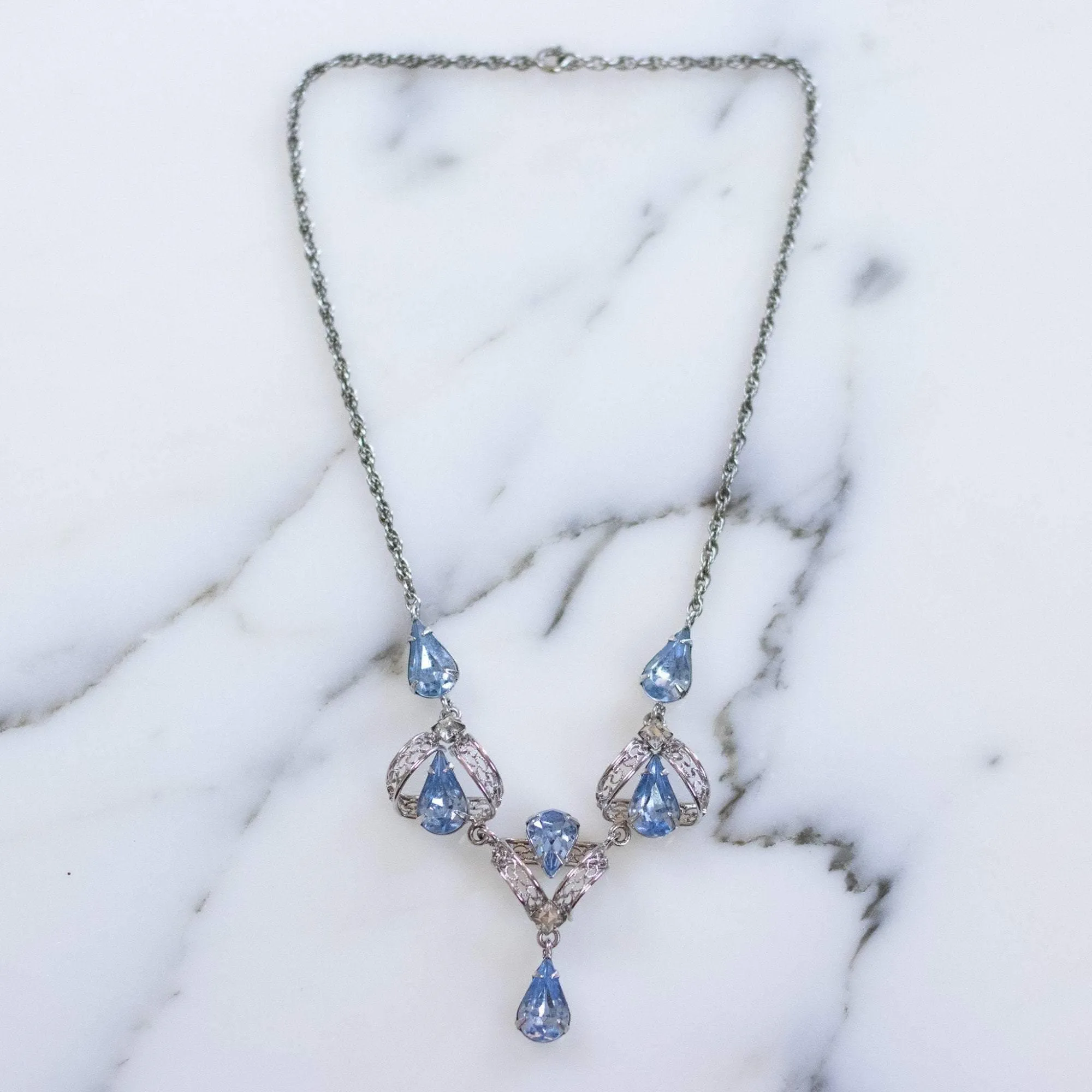 Vintage 1950s Silver Filigree Lavalier Necklace with Blue Crystals